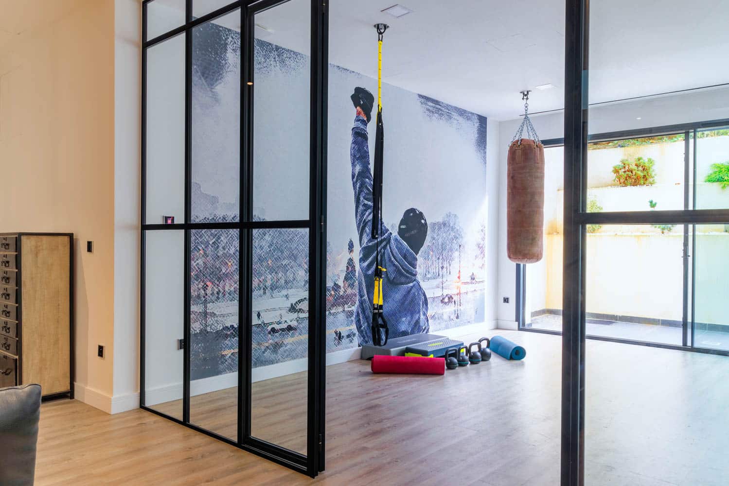 salle de sport dans maison en location courte durée haut de gamme