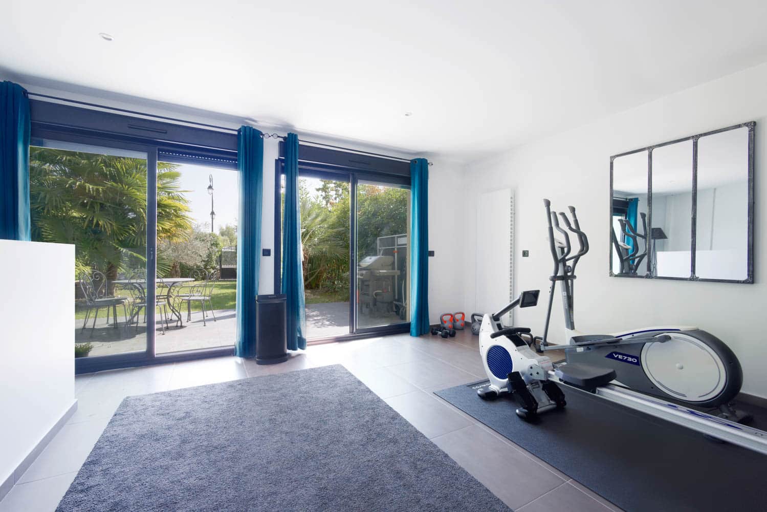 salle de sport dans maison En location courte durée haut de gamme